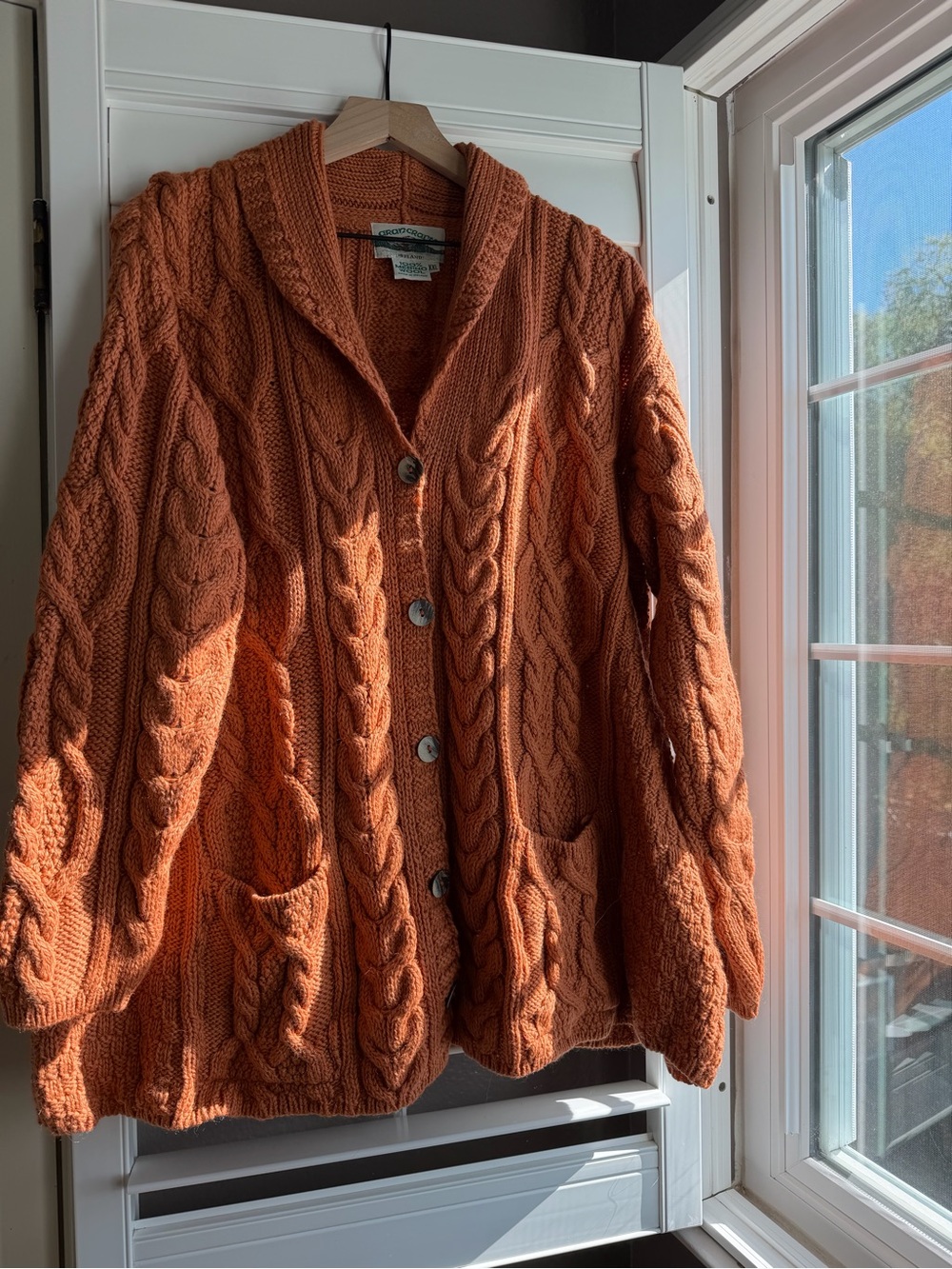 Aran Crafts Cable Knit Button-Front Cardigan in Rust Orange